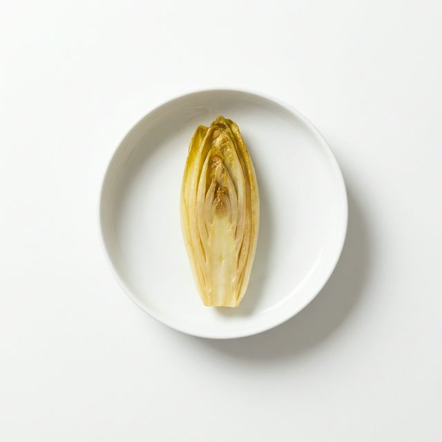 Chicoree gedünstet (mit Fett und Salz)