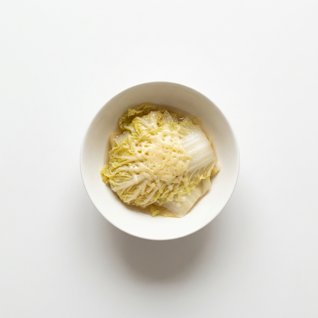 Chinakohl gedünstet, mit geriebenem Käse