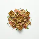 Artischockenviertel gebraten mit Steinpilzen und Speck