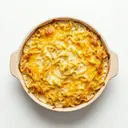 Auflauf aus Eier-Frischteigwaren mit Sahne-Käsesauce und Chester überbacken