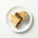 Burrito gefüllt mit Gemüse, Pilzen und Käse