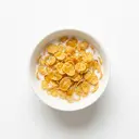 Cornflakes mit Milch 1,5 % Fett und Honig gesüßt