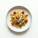 Eierteigwaren gebraten mit Steinpilzen und Tomaten