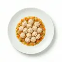 Fischklößchen mit Rotbarsch gegart und Gemüsesauce von heller/weißer Grundsauce