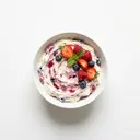 Frischkäsezubereitung mind. 20 % Fett i. Tr., mit Fruchtzubereitung, gesüßt, angereichert mit Calcium