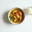 Hummer gegart, in Currysauce von heller/weißer Grundsauce