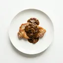 Jägerschnitzel (Schweineschnitzel natur, gebraten, mit Pilzsauce)