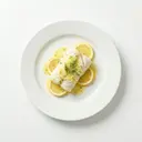 Kabeljaufilet gedünstet, mit Zitronenbutter und Sauce