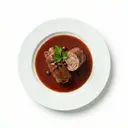 Kalbsroulade geschmort, mit Rotweinsauce von dunkler/brauner Grundsauce