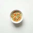Karotten und Erbsen gedünstet, in Grundsauce hell/weiß mit Sahne