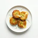 Kartoffelküchlein mit Käse gebraten