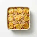 Kartoffelschichtspeise mit Sauerkraut und Kochschinken, überbacken