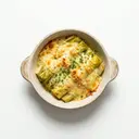 Lauch gedünstet, mit Butter und Käse