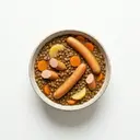 Linsen-Eintopf mit Suppengemüse, Kartoffeln und Wiener Würstchen