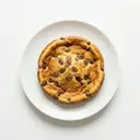 Pfannkuchen/Eierkuchen, mit Milch 3,5 % Fett und Rosinen, gebraten