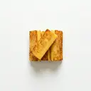 Polenta (Maisbrei zubereitet mit Wasser, Rapsöl und Salz) gebacken