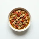 Putenragout mit Tomaten und Champignons