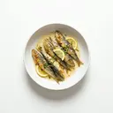 Sardinen in Weißwein, gebacken