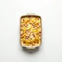 Schinkenkartoffeln mit saurer Sahne und Käse überbacken