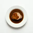 Schweinebraten mit Grundsauce dunkel/braun