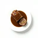 Schweineroulade geschmort, mit Grundsauce dunkel/braun