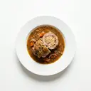 Schweineroulade mit Sauerkrautfüllung geschmort, mit Sauce