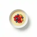 Vanillepudding, Flammeri, zubereitet aus Pulver und Milch 1,5 % Fett, mit Früchten