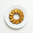 Zucchinischeiben paniert, gebraten