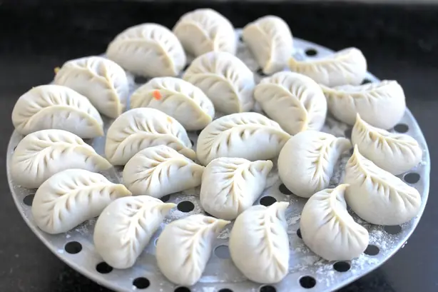 Foto von Südafrikanische Souskluitjies – fertig angerichtet