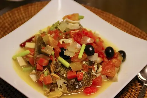 Foto von Acqua Pazza – Fisch im Kräuterbad – fertig angerichtet