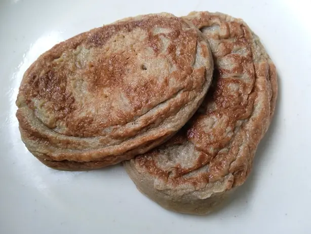 Foto von Malaysischer Akok-Kuchen – fertig angerichtet